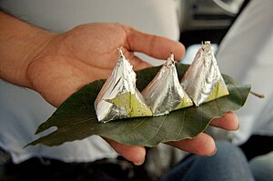 Paan, (betel leaves) being served with silver foil, India.jpg